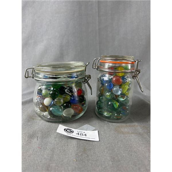 2 Jars w/ Glass Lids Filled w/ Marbles