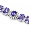 Image 1 : 14k Gold Bracelet with 29.00ct Tanzanite & 1.50ct