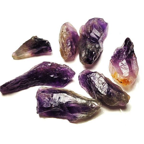 14)  LOT OF 21.6 GRAMS OF ROUGH AMETHYST GEMSTONES