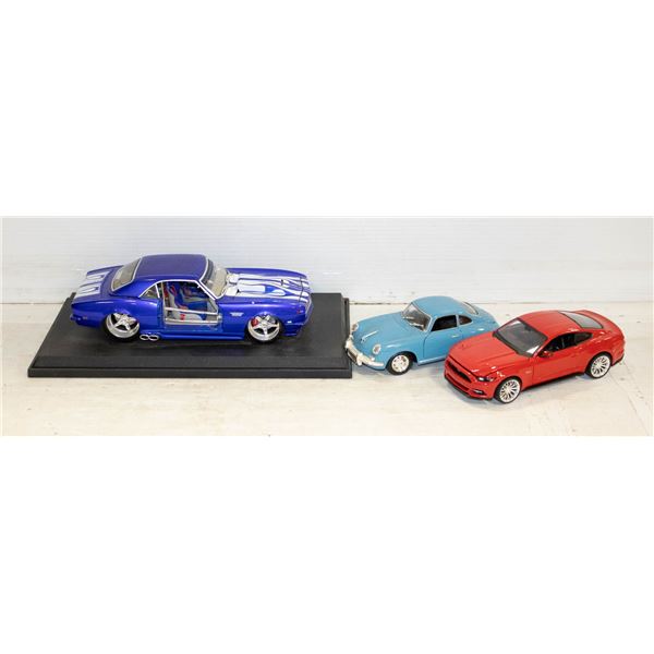 FLAT OF THREE DIE CAST CARS