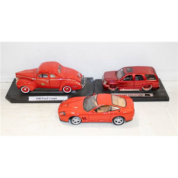 FLAT OF THREE DIE CAST CARS
