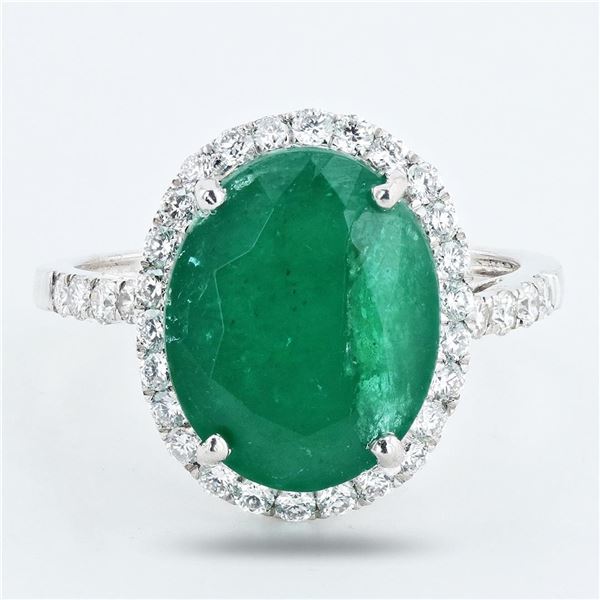 5.99 ctw Emerald and 0.68 ctw Diamond Platinum Ring