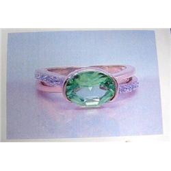 Peridot and diamond lady's ring 14 K yellow gold- peridot is oval, faceted approx. 2.00 carats, tran