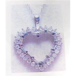 Diamond heart pendant and chain 14 K yellow gold- diamonds are full cut approx. 1.10 carats- estimat
