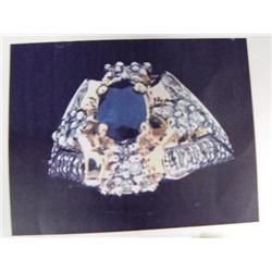 Sapphire and diamond lady's ring 14 K yellow gold- sapphire is oval, faceted approx. 1.00 carats, tr