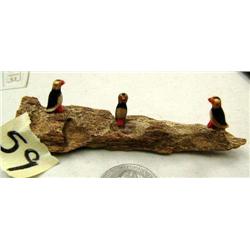 3 ivory puffins on bone (2)