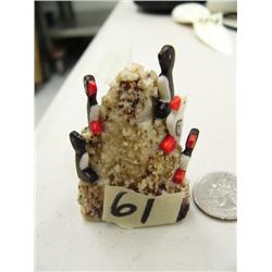 Ivory rookery on walrus ivory base by Gerald Penatac from King Island, Alaska- 2-1/4" tall, 1-1/2" w