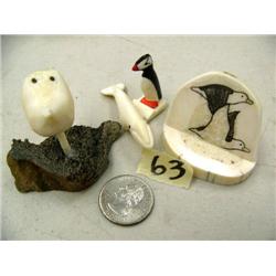 Lot of 4 ivory items: spirit mask, small whale, puffin, bird scrimshaw (2)