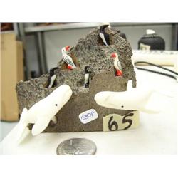 Ivory puffin rookery with 2 ivory beluga whales mounted on bone, 280f (2)