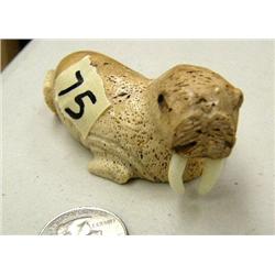 Bone walrus with ivory tusks, 223f- 3-1/2" long (2)