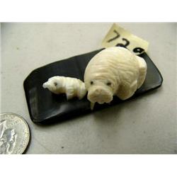 CHOICE on 2: walrus ivory mother and calf on baleen by Robert Apatiki, 70f (2)