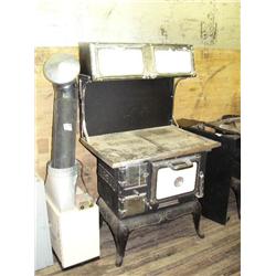 Wood cook stove- new and cast iron- from Montgomery Ward (81)
