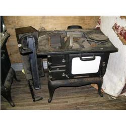 Cast iron stove- never been used (81)