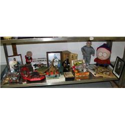 Whole shelf of collectible toys and sports and comic books (76)
