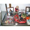 Image 2 : Whole shelf of collectible toys and sports and comic books (76)