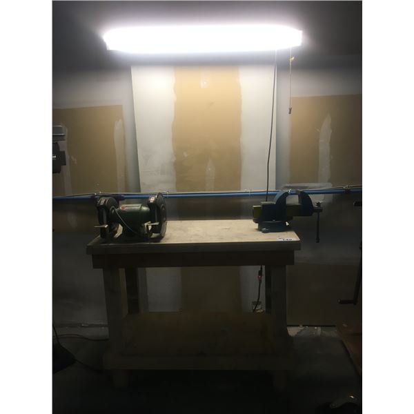 WOODEN WORK TABLE WITH 4" MECHANICS VISE, 8" BENCH GRINDER AND OVERHEAD LIGHT