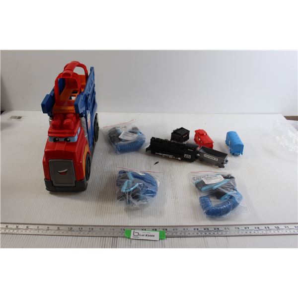 (3) Toddler Leashes, Toy Car, (5) Toy Train Pieces