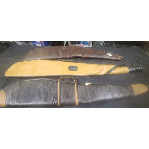 THREE LEATHER CASES