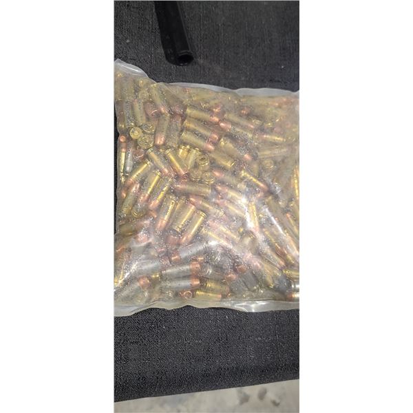 ROUGHLY 12LBS OF FACTORY MISSLOADS A MIX OF RFLE AND PISTOL AMMUNITION  MARKED DISPOSAL. BRASS/BULLE