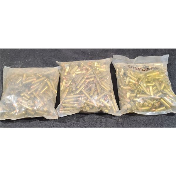 ROUGHLY 22LBS OF FACTORY MISSLOADS A MIX OF RFLE AND PISTOL AMMUNITION  MARKED DISPOSAL. BRASS/BULLE