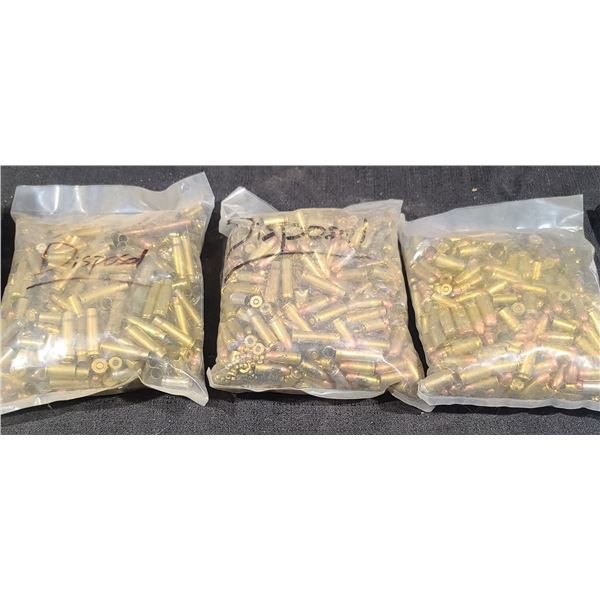 ROUGHLY 30LBS OF FACTORY MISSLOADS A MIX OF RFLE AND PISTOL AMMUNITION  MARKED DISPOSAL. BRASS/BULLE