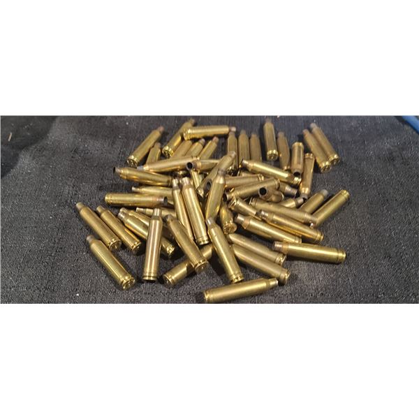 QTY56 7MM REM MAG SPENT BRASS (SOME HORNADY)