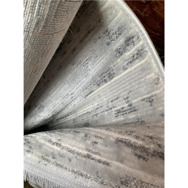 7'x10x Beige Area Rug