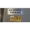 Image 1 : RESERVED METAL PARKING SIGN AND YUKON LICENSE PLATE