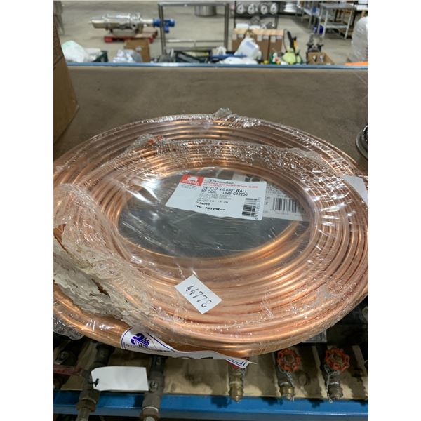 REEL OF BROWN ELECTRICAL CABLE ROLLS OF COPPER PIPING SMALL Reel of brown electrical cable rolls of copper piping small