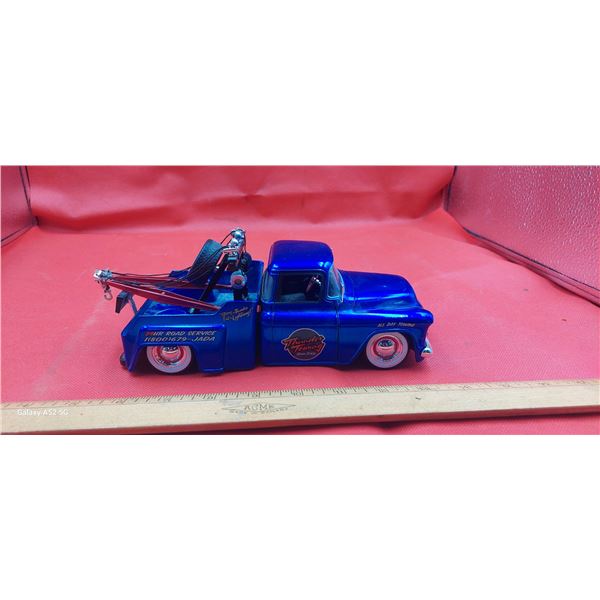 Collection of three die cast trucks inc. 2 tow trucks