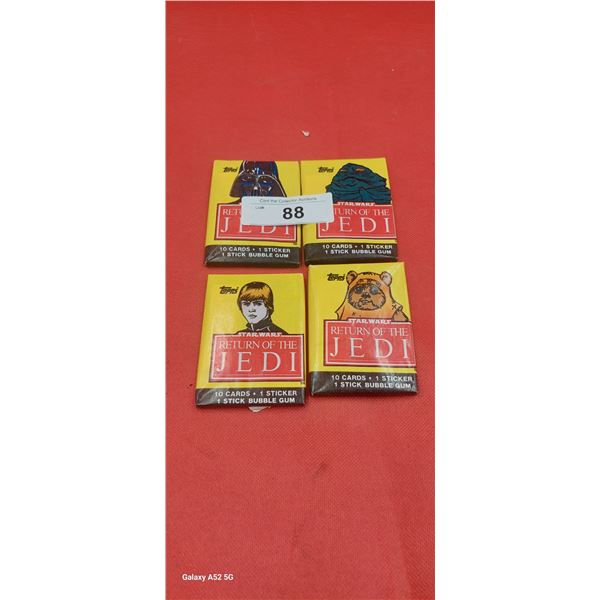Collection of 4 unopened packs of 1983 Star Wars Return of the Jedi bubble gum trading cards