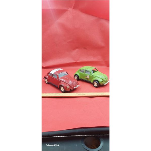 Pair of vintage Tonka pressed steel Volkswagen Beetles