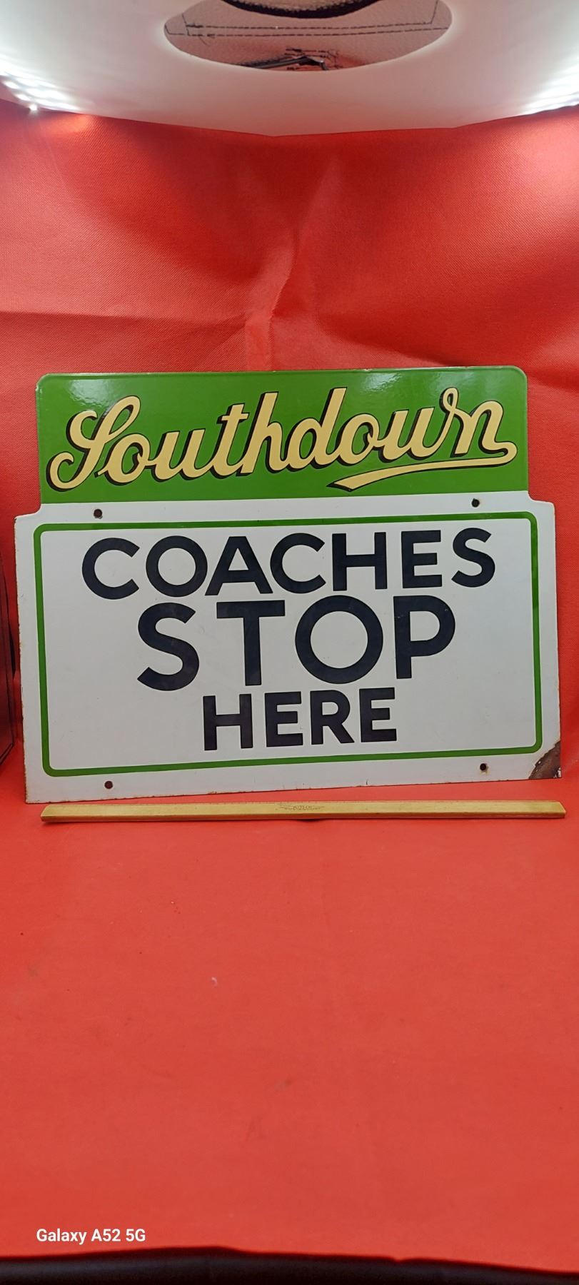 Vintage porcelain sign from England, Southdown Coaches top Here, 20