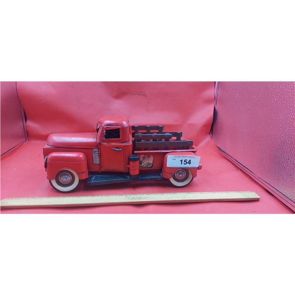 2 metal trucks, farm truck and Tonka Jeep fire truck
