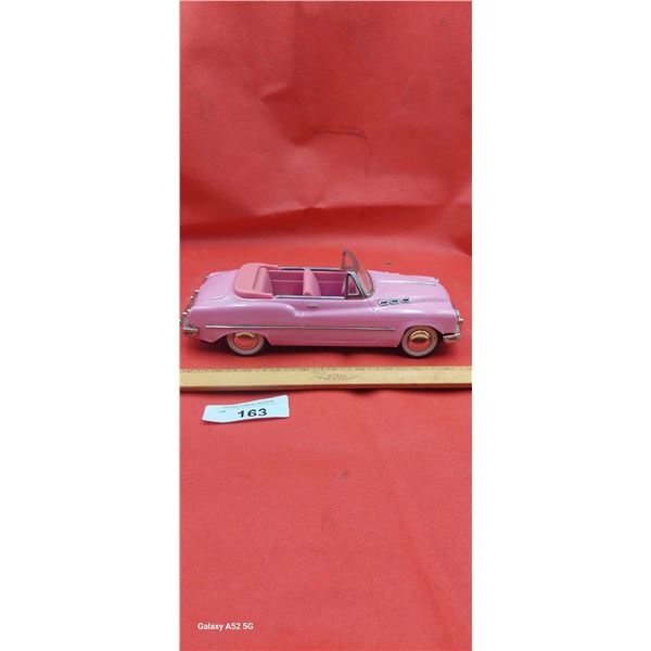 Tin toy pink Buick, 11" long