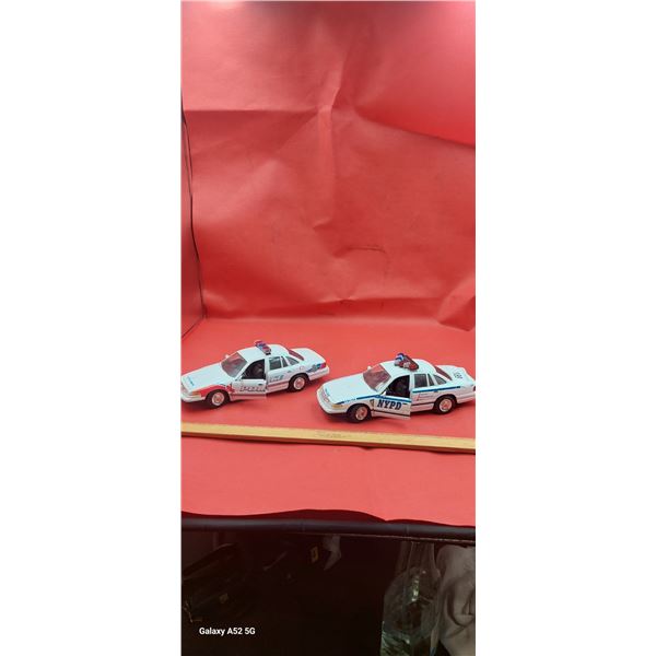 Pair of die cast police cars