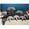Image 1 : Lot of 4 Nintendo 64 Consoles w/ 4 Controllers & Accessories - Used - For Parts/Repair