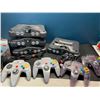 Image 2 : Lot of 4 Nintendo 64 Consoles w/ 4 Controllers & Accessories - Used - For Parts/Repair