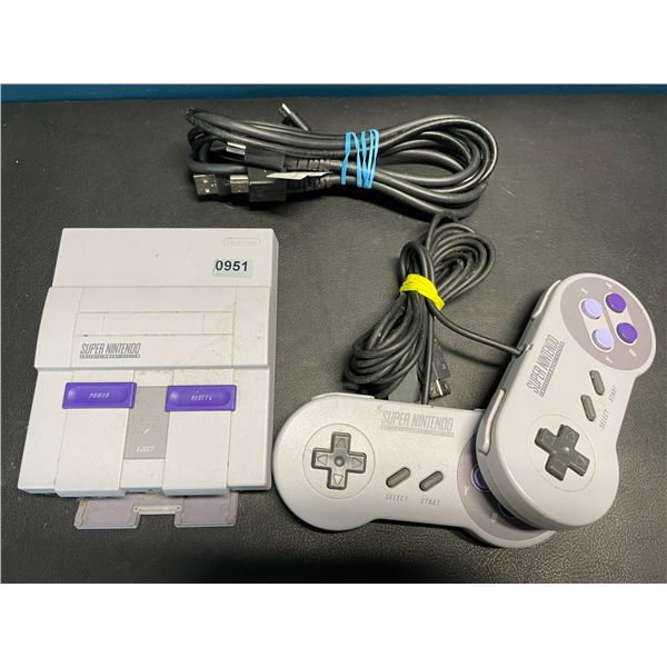 Lot of 1 Super Nintendo Entertainment System (SNES) w/ Cord & 2 Controllers - Used - Powers On/Works
