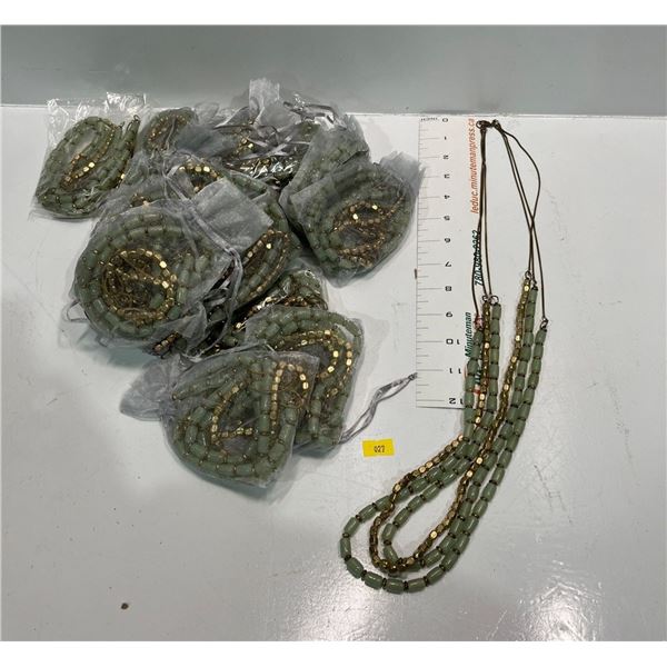 Multi Leather Strand with Light Green and "Gold"  Beads Necklace  19 pieces