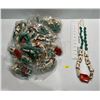 Image 1 : Leather Strand with "Bone", Green, and Red Beads  23 pieces
