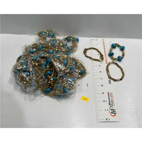 Three "Gold" and Blue Bead Bracelets  22 sets