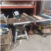 Image 1 : RIGID 10 INCH TABLE SAW C/W 48 INCH EXTENTION AND WHEELS ON TABLE