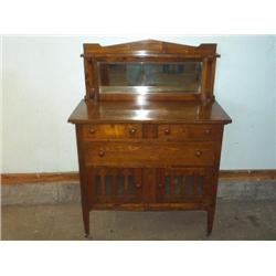 Oak mirrored back buffet