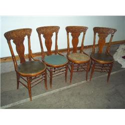 Carved back Oak chairs