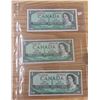 Image 1 : Lot of Three 1954 Canada $1 bills:  Lawson/Bouey (#C/I 2764368), Beattie/Rasminsky (#A/F 9991199 & #