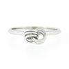 Image 4 : Petite 18K White Gold Simple Polished Interlocking Triple Wire Open Knot Ring