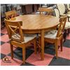 Image 1 : ROUND SOLID WOOD TABLE WITH BUTTERFLY LEAF + 4