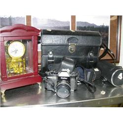 Vivitar 400SL camera, Vivitar 200 mm telephoto lens with case, Vivitar 50mm 1:1.9 lens, Vivitar auto