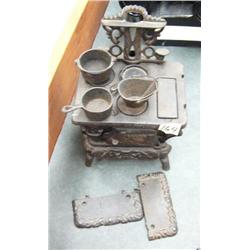 Child's wood cook stove manufactured by Crescent (82)